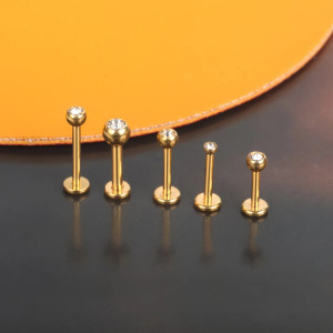 Интернал-лабрета 1,2 мм, накрутка 2 мм с кристаллом. Титан, золотое анодирование. LBICT2J16G